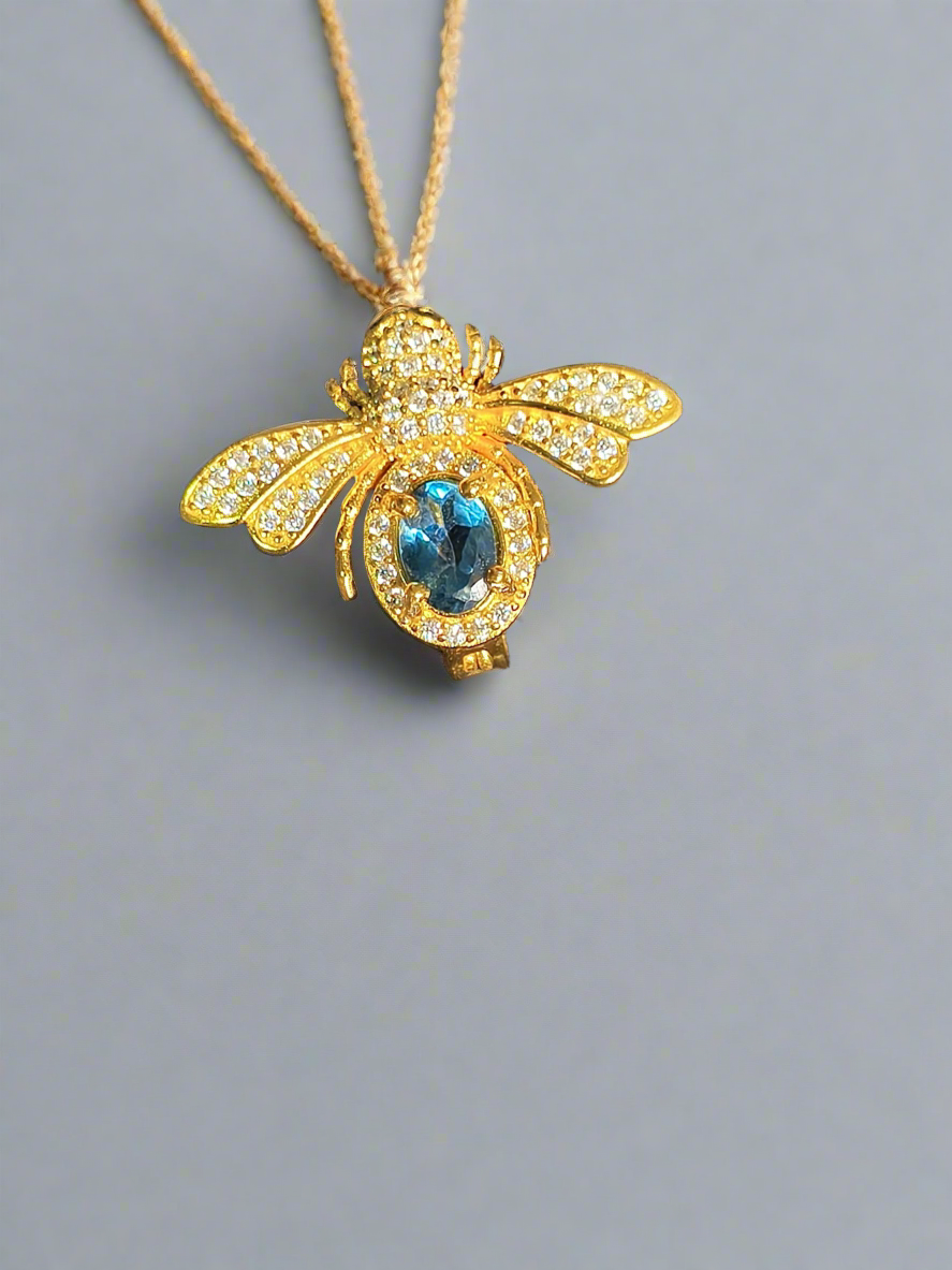 14k gold over .925 SS London blue topaz 