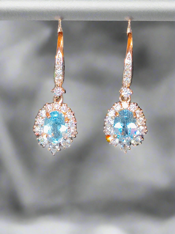 Pre mounted blue topaz earrings w/cz